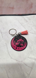 Pink mushroom on black arcylic keychain