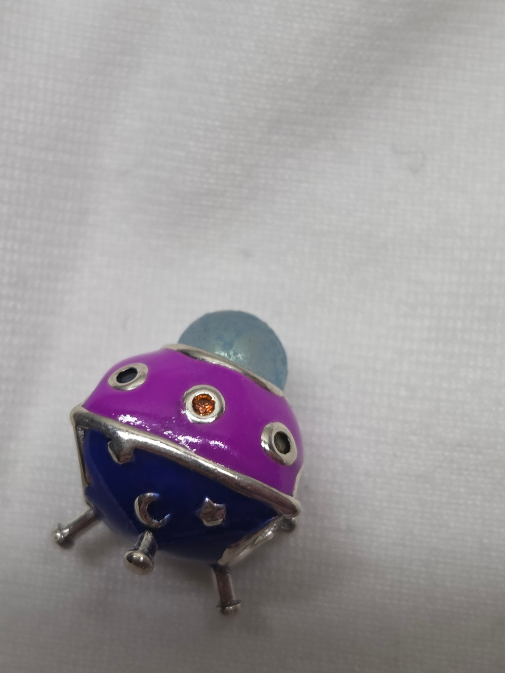 Alien ship charm