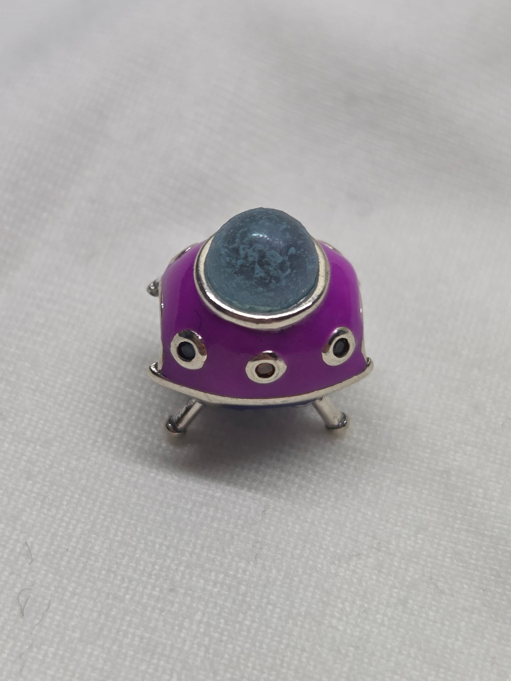 Alien ship charm