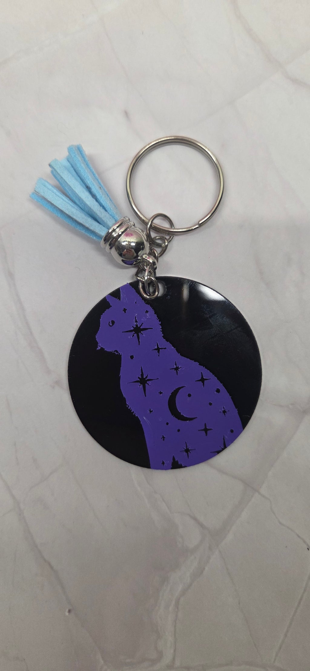 Black arcylic keychain with stary cat
