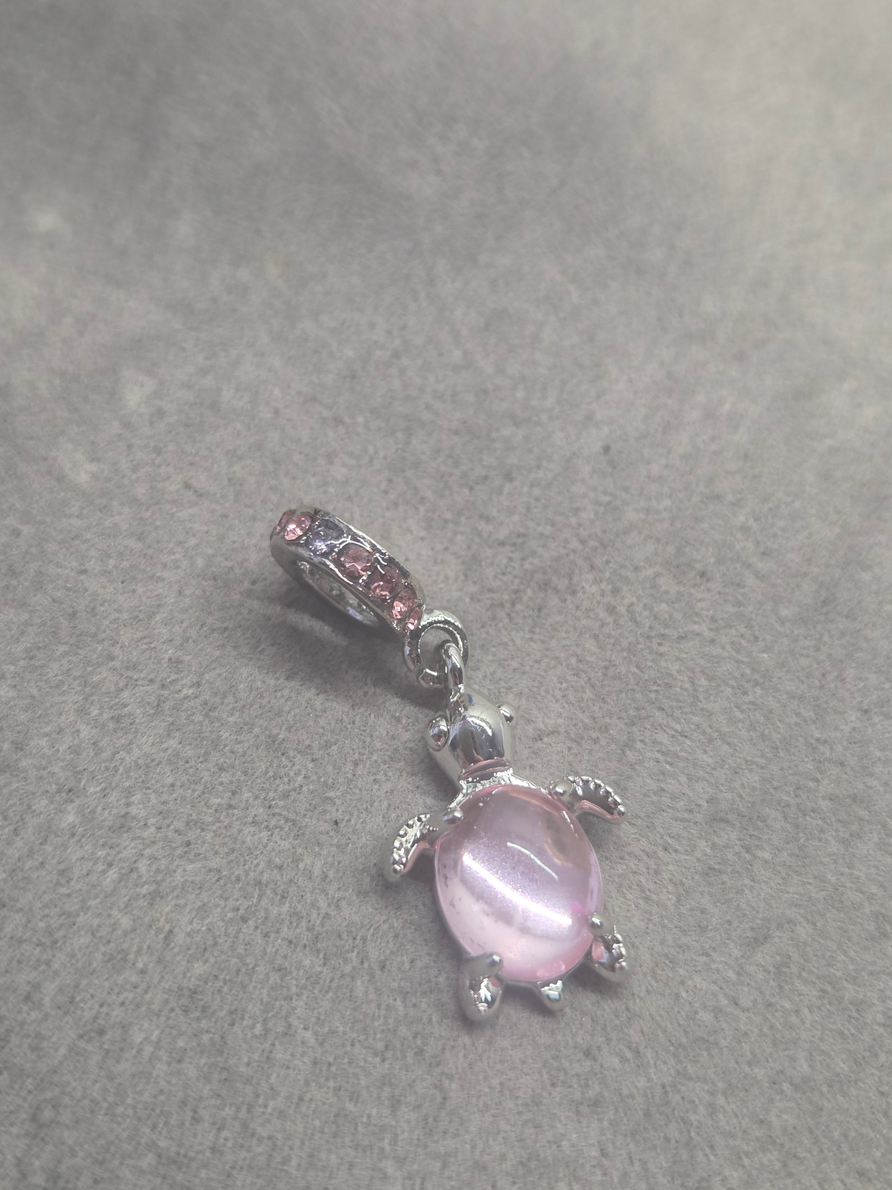 Pink turtle charm