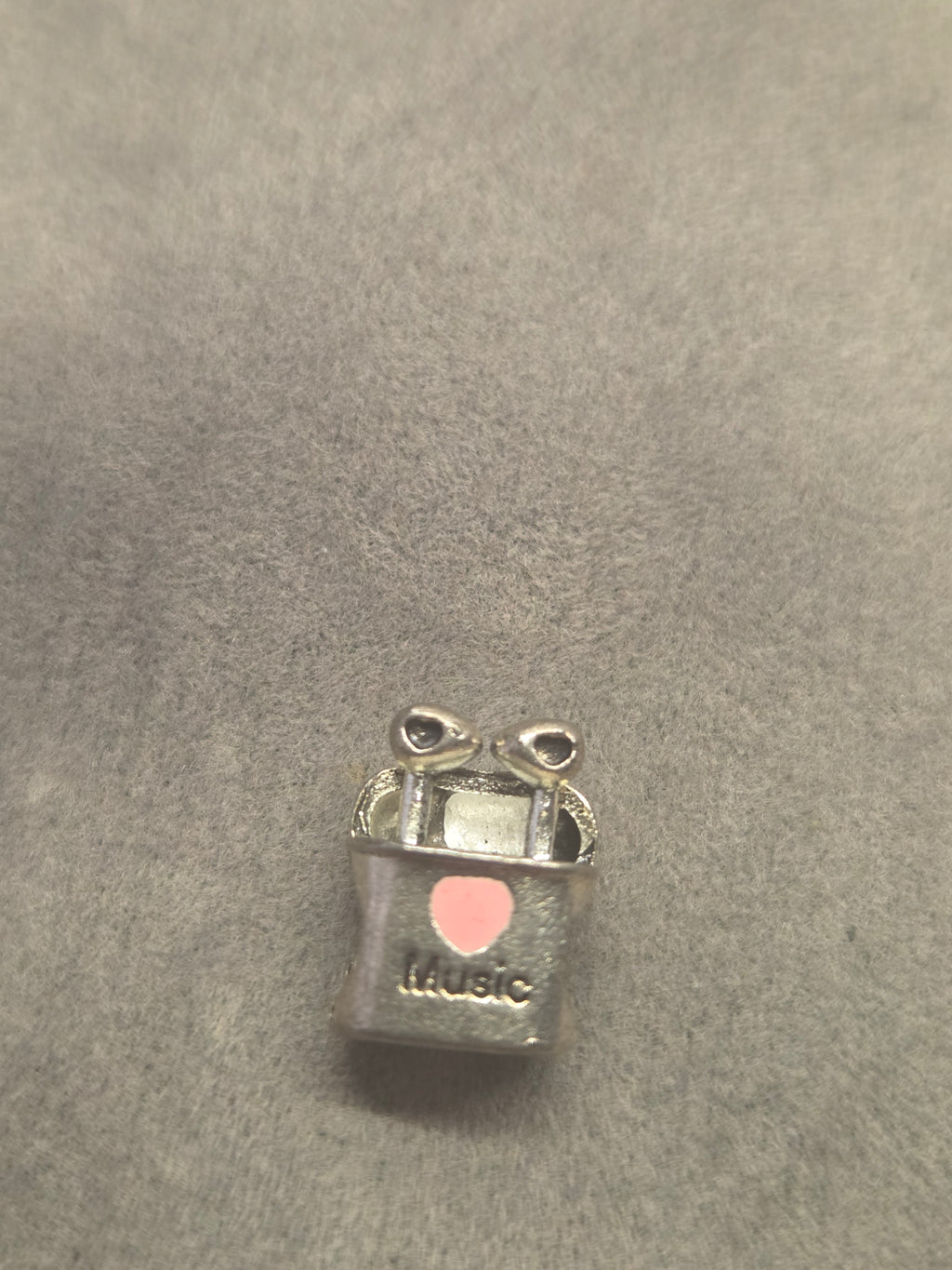 Earphones charm