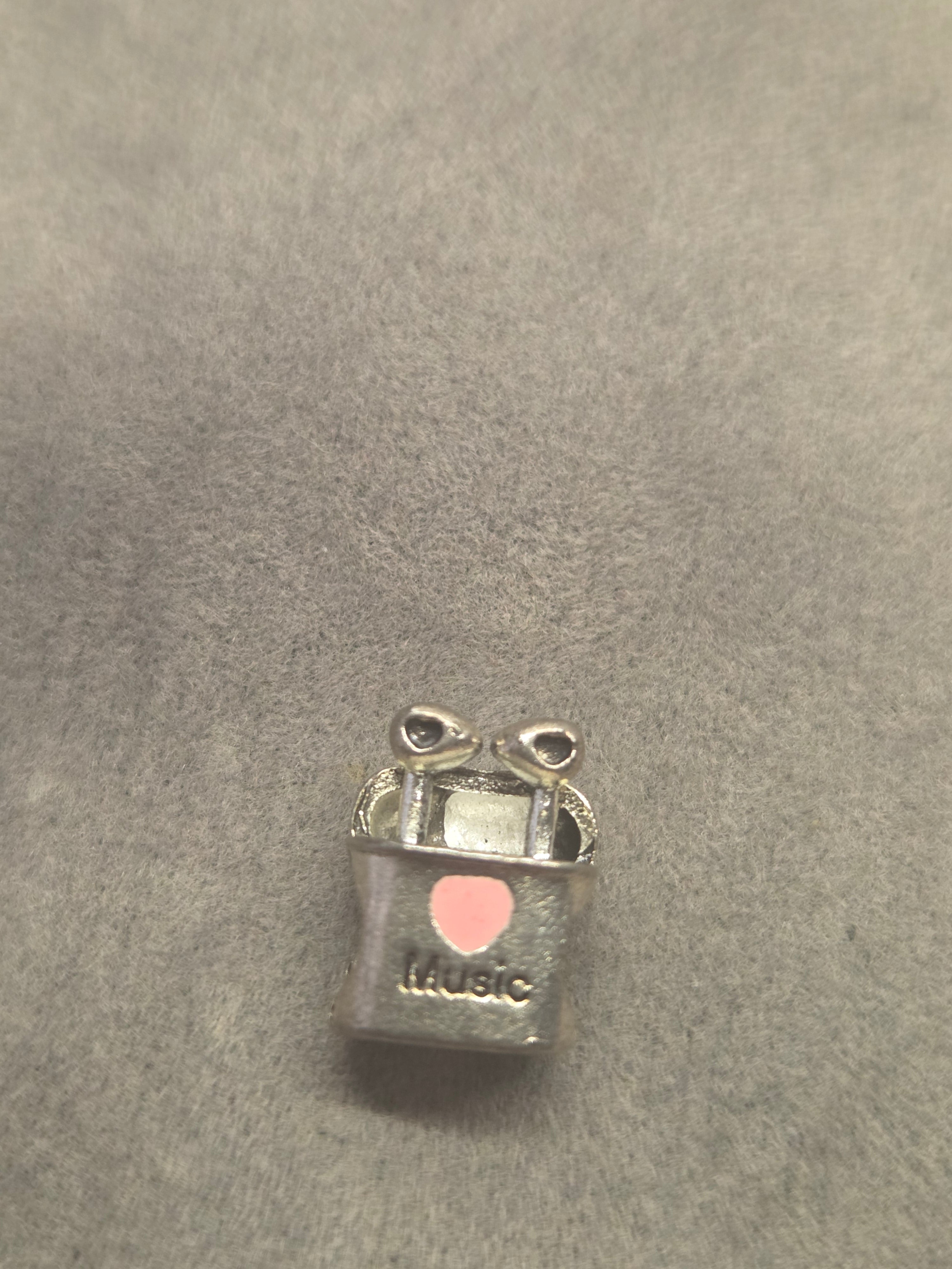 Earphones charm