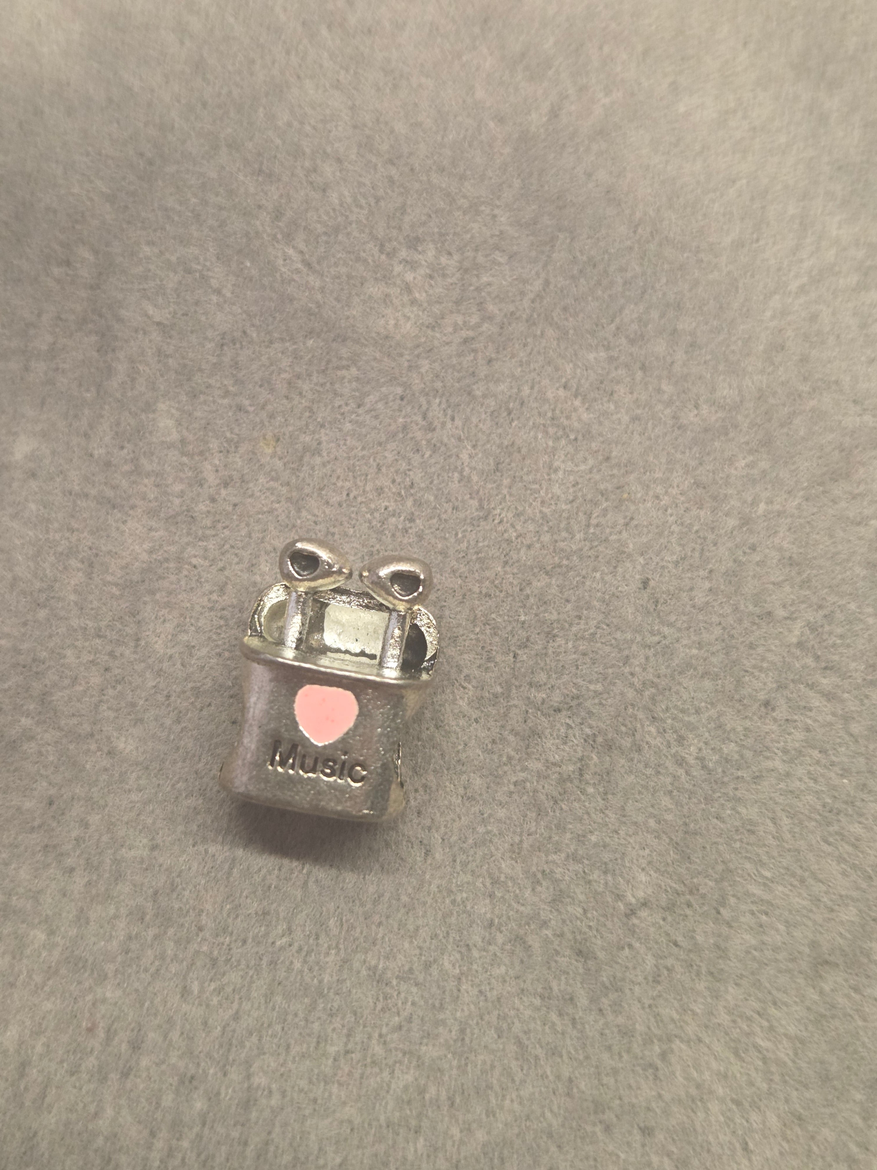 Earphones charm