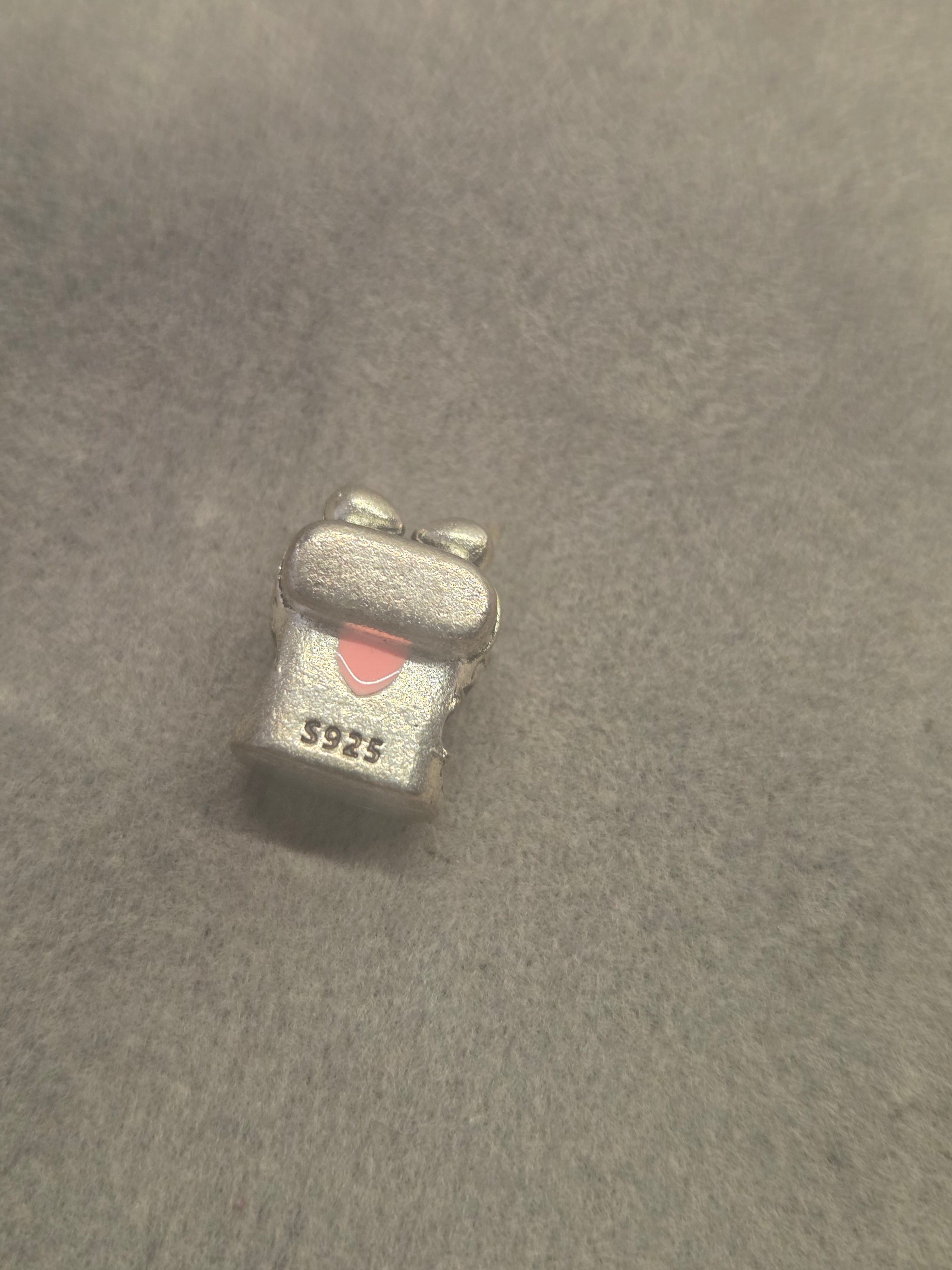 Earphones charm
